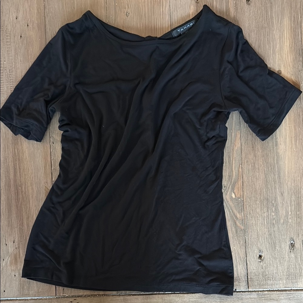 Black top with peep hole in back.